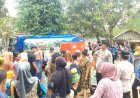 Polsek Bojong dan Muspika Salurkan Air Bersih serta Gelar Bazar Pangan Murah Untuk Warga